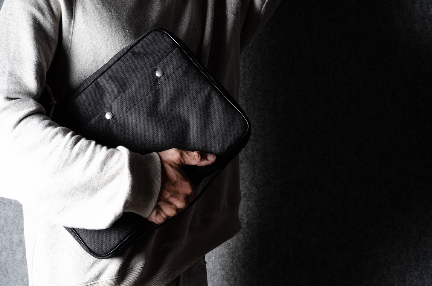 A suitable laptop bag. Charcoal gray.