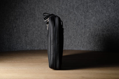 A suitable laptop bag. Charcoal gray.